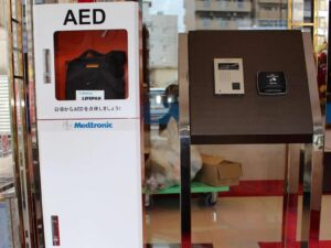 a box with a sign and a box with a bag in it