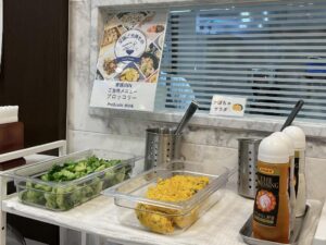 a table with food in containers